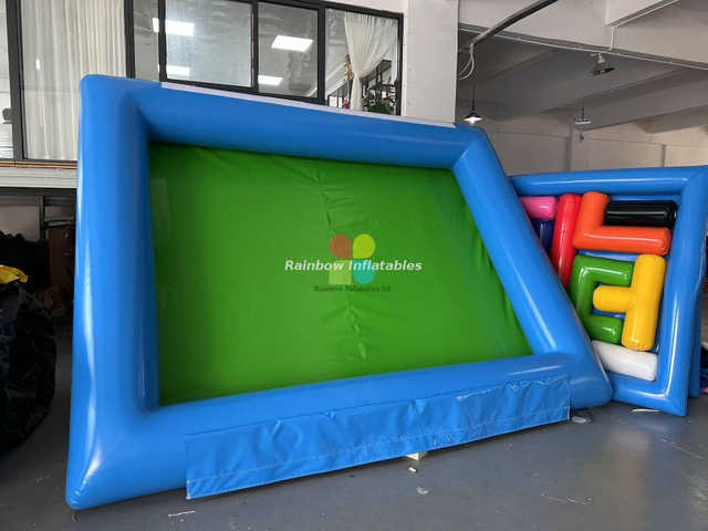Inflatable obstacle linked pool