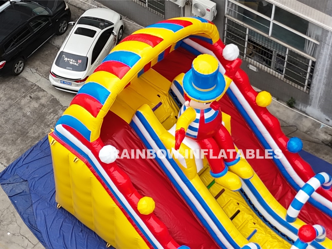 Rainbow inflatable slide for kids