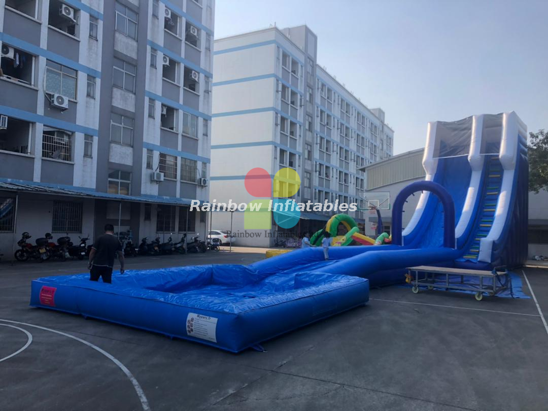 Rainbow water slide with pool