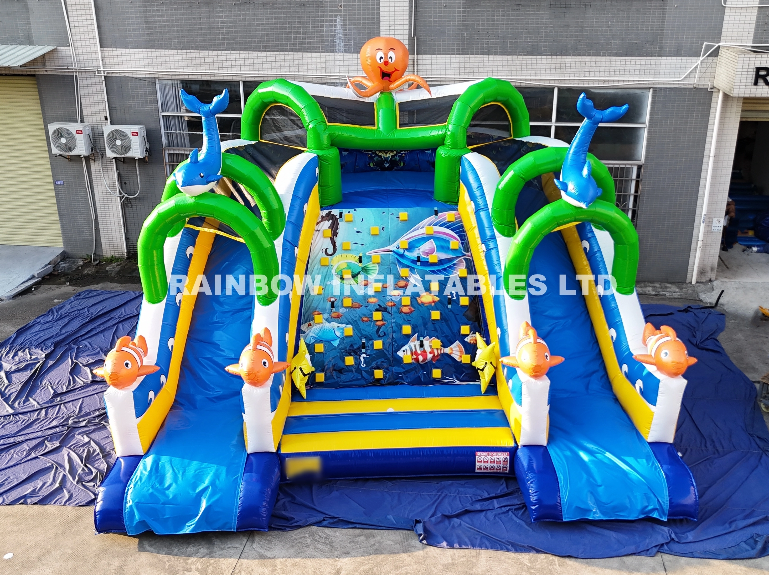 Customized Commercial Inflatable Ocean Theme Slide Castle, Wholesale Outdoor Kids Inflatable Bounce House with Double Slides, Central Climbing Wall and Sea Animal Decorations for Amusement Park