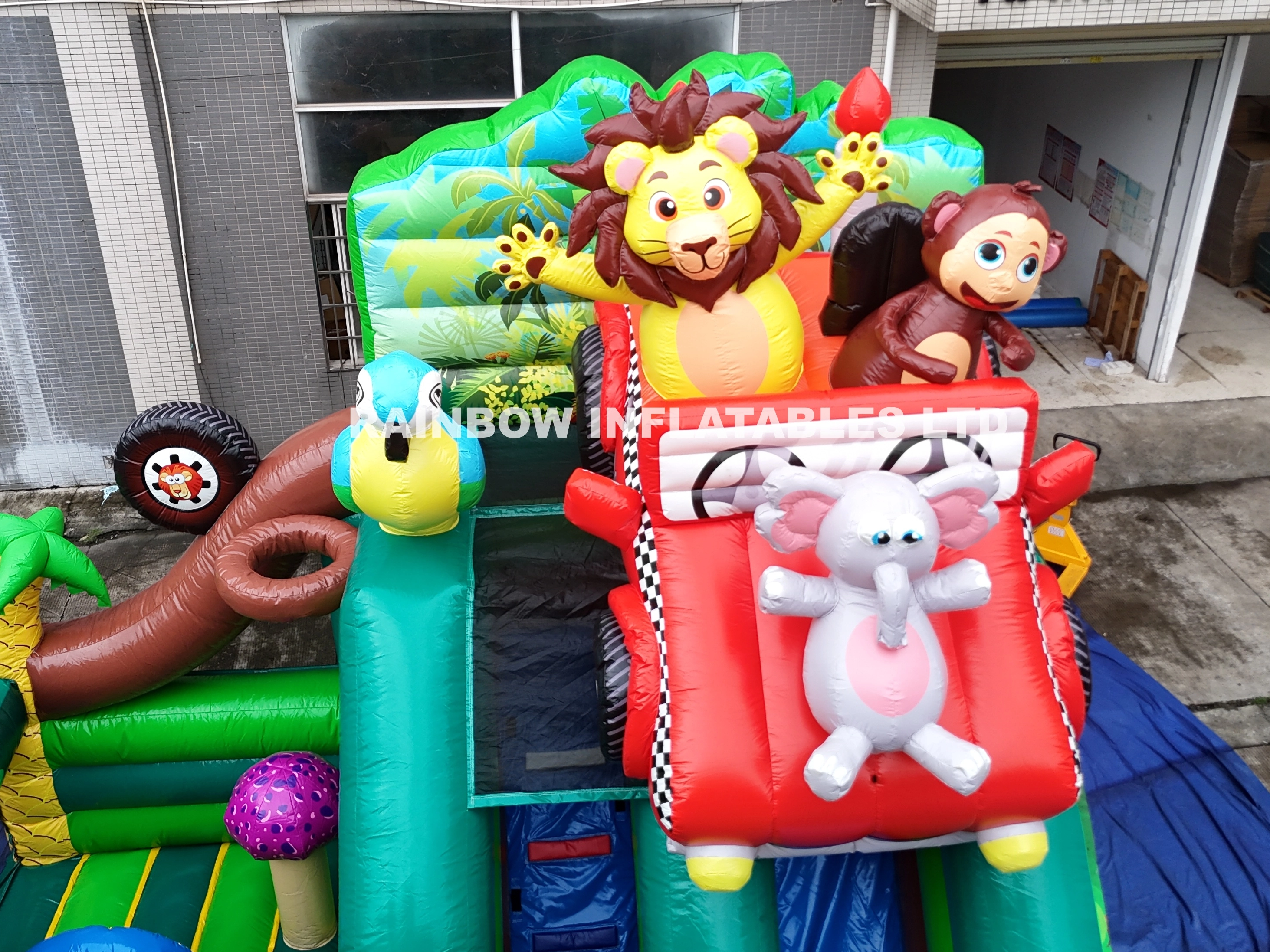 Colorful Lion-Themed Inflatable Combo Castle with Fun Slide
