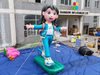 Inflatable girl figure with light